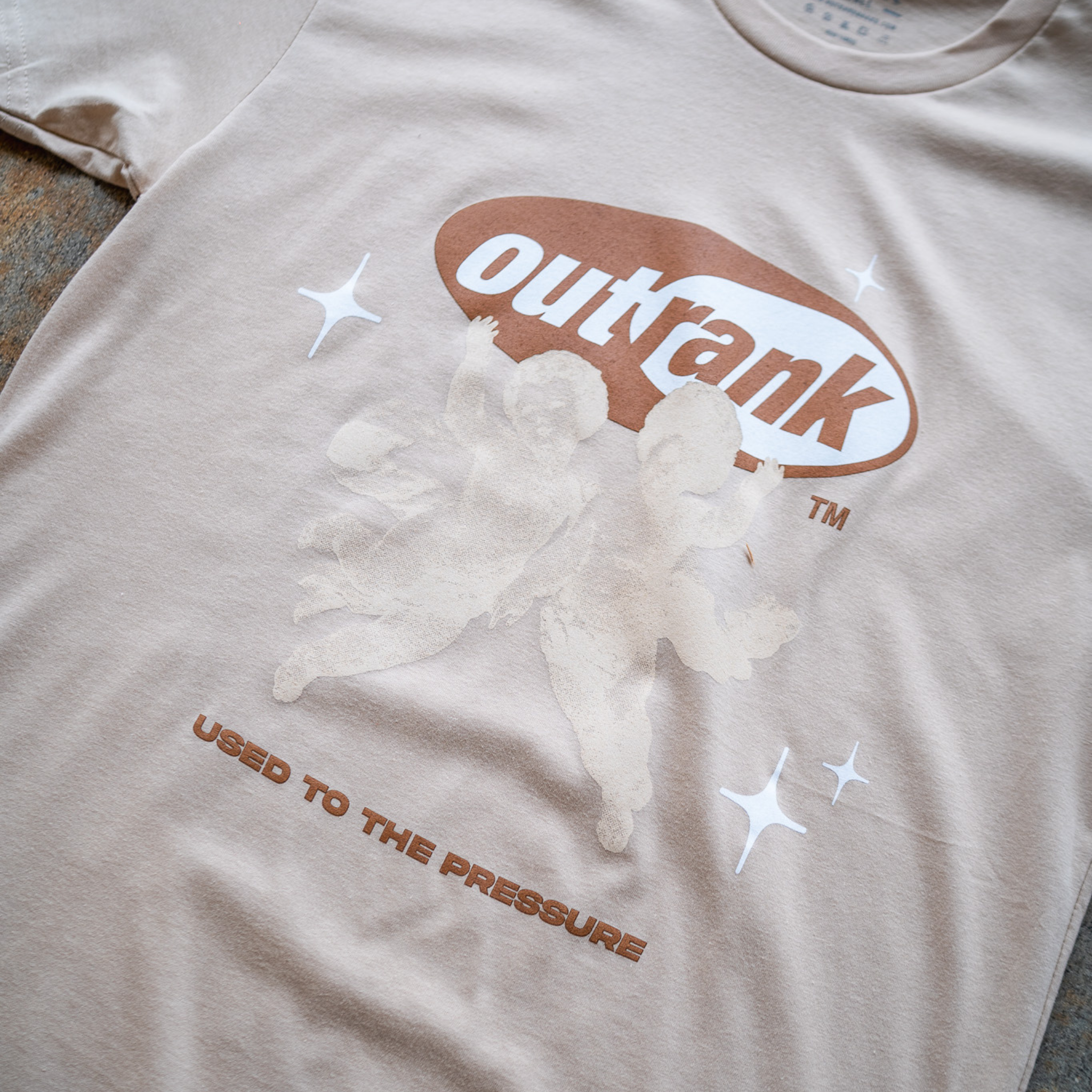 Outrank Used To The Pressure T-shirt (Cream/Brown) - Outrank